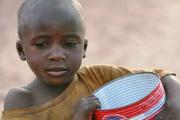 Talibe boy begging in Dakar.